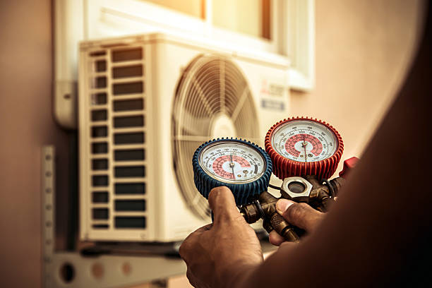 Professional Hvac technician working in Forest Hills, MI